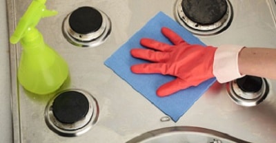 clean the gas stove from grease and carbon deposits